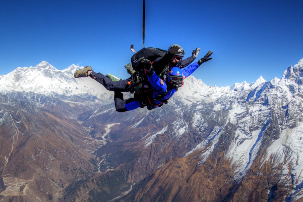 Anyone now can make a jump and get a photo tandem skydiving in from of Mount Everest with an experienced instructor